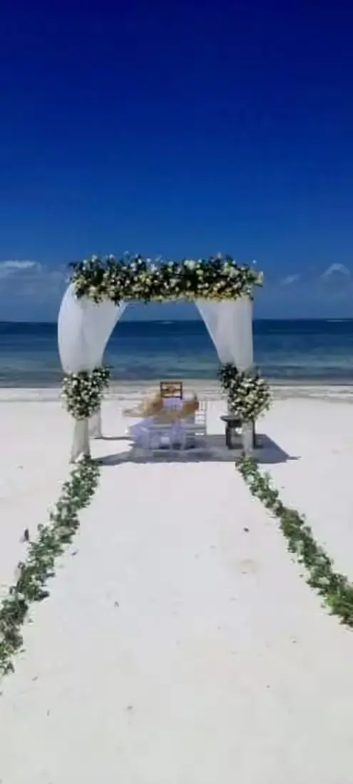 Romantic Zanzibar beach decoration and dinner setup photo