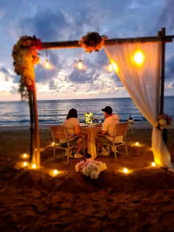 Romantic Zanzibar beach decoration and dinner setup photo