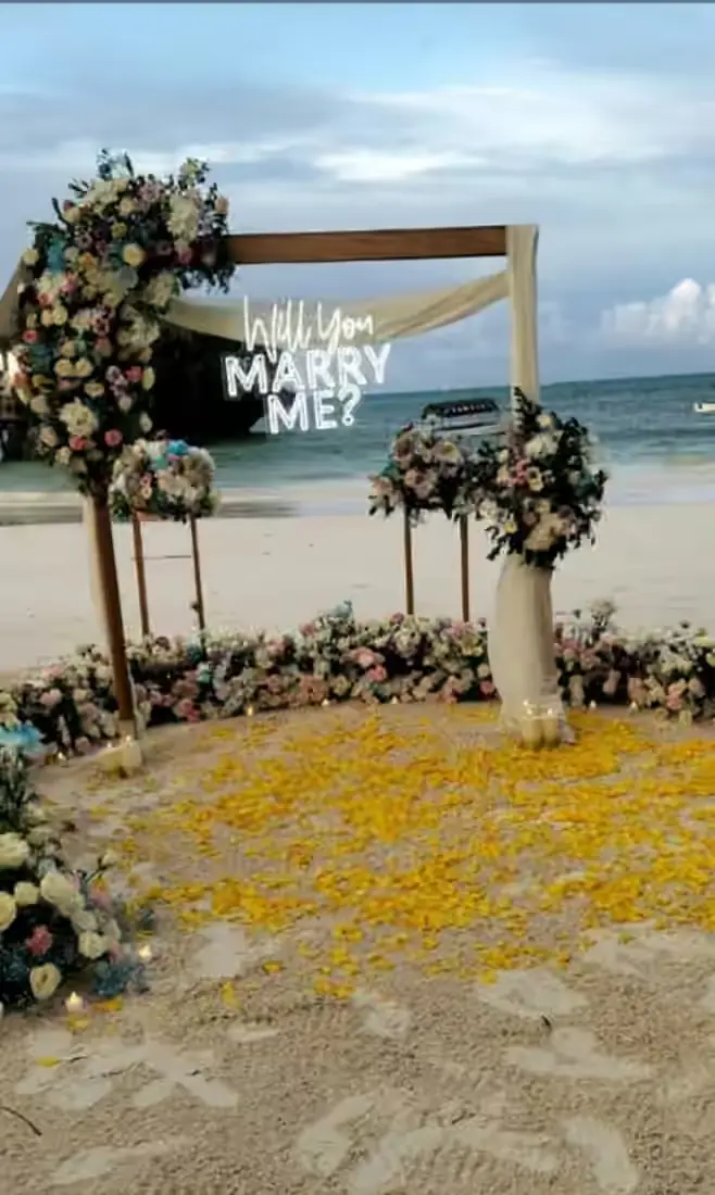 Zanzibar beach proposal floral decoration and romantic arch