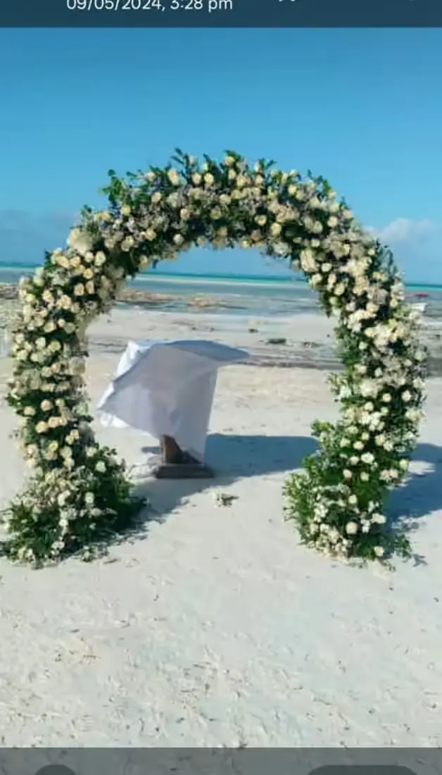 Zanzibar beach proposal floral decoration and romantic arch