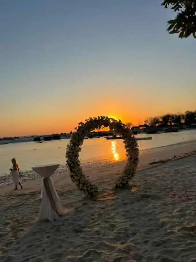 Romantic Zanzibar beach decoration and dinner setup photo