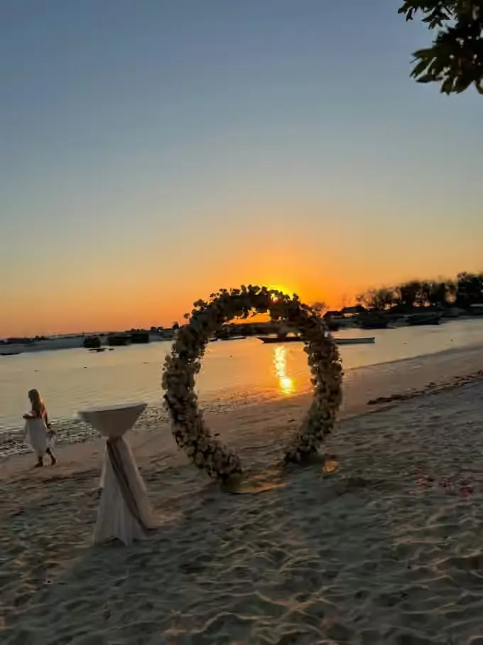 Romantic Zanzibar beach decoration and dinner setup photo